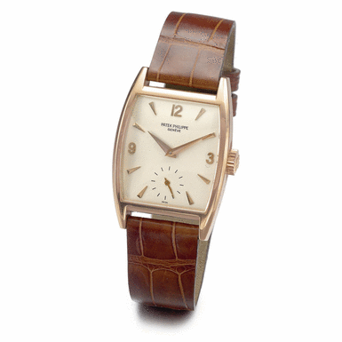 PATEK PHILIPPE - AN 18K PINK GOLD CURVED TONNEAU WRISTWATCH 1951 REF 2469R MVT 974071 CASE 668058
