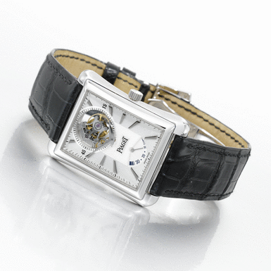 PIAGET - A FINE 18K WHITE GOLD FLARED RECTANGULAR TOURBILLON WRISTWATCH WITH POWER RESERVE CIRCA 2005 REF P10106 EMPERADOR NO 04