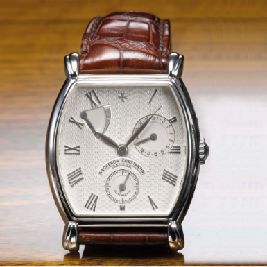 VACHERON CONSTANTIN - A FINE WHITE GOLD AUTOMATIC TONNEAU-FORM WRISTWATCH WITH DATE AND POWER RESERVE INDICATION CIRCA 2005 JUBIL