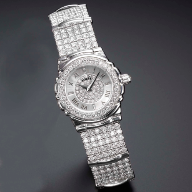 PIAGET - A LADY'S WHITE GOLD AND DIAMOND-SET BRACELET WATCH CIRCA 1995 TANAGRA