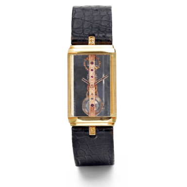 CORUM - A YELLOW GOLD BACK-WOUND RECTANGULAR WRISTWATCH WITH STRAIGHT-LINE MOVEMENT CIRCA 1990 GOLDEN BRIDGE