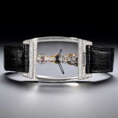 CORUM - A FINE WHITE GOLD AND DIAMOND-SET SKELETONIZED TONNEAU-FORM WRISTWATCH CIRCA 2007 GOLDEN BRIDGE