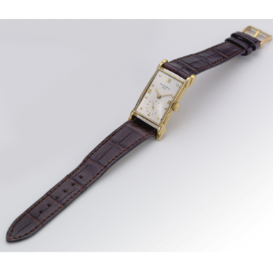 PATEK PHILIPPE - AN 18K YELLOW GOLD RECTANGULAR WRISTWATCH WITH UNUSUAL LUGS 1948 REF 2415 MVT 970669 CASE 510700