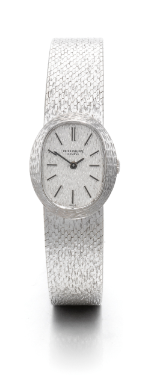 PATEK PHILIPPE - A LADY'S OVAL 18K WHITE GOLD BRACELET WATCH 1971 REF 4111-1 MVT 1245021 CASE 521469