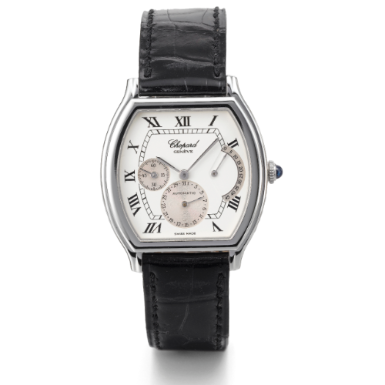 CHOPARD - A PLATINUM TONNEAU-FORM AUTOMATIC WRISTWATCH WITH DATE AND POWER RESERVE INDICATION CIRCA 2000