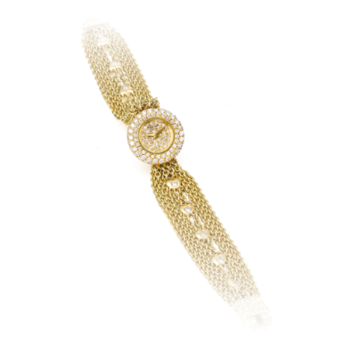 CHOPARD - A LADY'S YELLOW GOLD AND DIAMOND-SET BRACELET WATCH CIRCA 1990