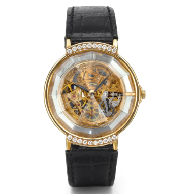 CORUM - A YELLOW GOLD AND DIAMOND-SET SKELETONIZED WRISTWATCH CIRCA 1990 PRISM