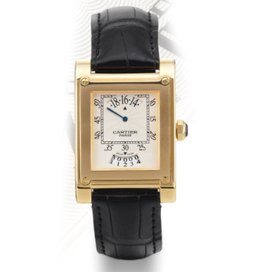 CARTIER - A YELLOW GOLD RECTANGULAR WRISTWATCH WITH WANDERING HOUR AND DATE CIRCA 2003 TANK 