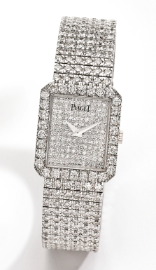 PIAGET - A LADY'S FINE 18K WHITE GOLD DIAMOND-SET RECTANGULAR BRACELET WATCH CIRCA 1995 REF 4154