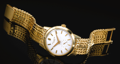 PATEK PHILIPPE - A FINE AND RARE 18K YELLOW GOLD WRISTWATCH WITH ENAMEL DIAL AND BRACELET 1957 REF 2577 MVT 747065 CASE 699549