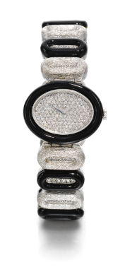 CHOPARD - A LADY'S 18K WHITE GOLD ONYX AND DIAMOND-SET BRACELET WATCH CIRCA 1980