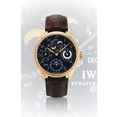 IWC - AN OVERSIZED PINK GOLD AUTOMATIC PERPETUAL CALENDAR WRISTWATCH WITH MOON-PHASES, LEAP YEAR AND 7-DAYS POWER RESERVE INDICATION CIRCA 2003 PORTUGUESE PERPETUAL CALENDAR