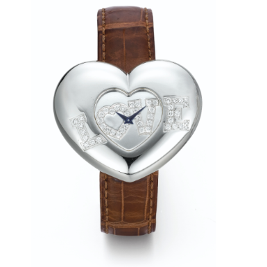 CHOPARD - A LADY'S WHITE GOLD AND DIAMOND-SET HEART-SHAPED WRISTWATCH CIRCA 2000 'LOVE