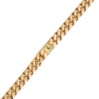 PIAGET - A LADY'S YELLOW GOLD BACK WOUND BRACELET WATCH CIRCA 1970