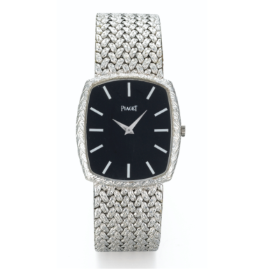 PIAGET - A WHITE GOLD CUSHION-FORM BRACELET WATCH CIRCA 1990