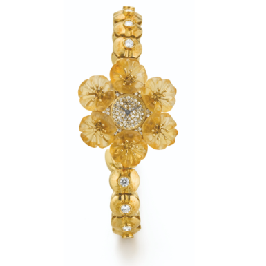 CHOPARD - AN AMUSING LADY'S YELLOW GOLD, DIAMOND-SET AND CARVED CITRINE BRACELET WATCH CIRCA 1995