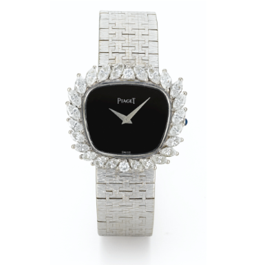 PIAGET - A LADY'S WHITE GOLD AND DIAMOND-SET BRACELET WATCH CIRCA 1972