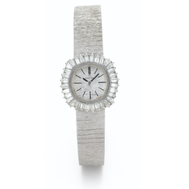 OMEGA - A LADY'S WHITE GOLD AND DIAMOND-SET BACK WOUND BRACELET WATCH CIRCA 1970