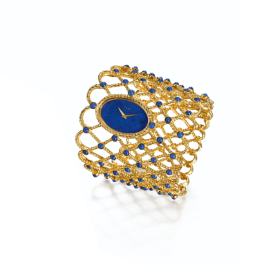 PIAGET - A FINE AND UNUSUAL LADY'S YELLOW GOLD AND LAPIS LAZULI BANGLE WATCH CIRCA 1970