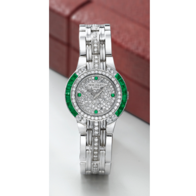PATEK PHILIPPE - A LADY'S WHITE GOLD, DIAMOND AND EMERALD-SET BRACELET WATCH 1991 REF 4786/1
