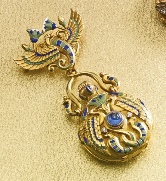 Tiffany & Co. and Marcus & Co. A YELLOW GOLD AND ENAMEL PENDANT WATCH WITH BROOCH IN EGYPTIAN REVIVAL STYLE CIRCA 1900