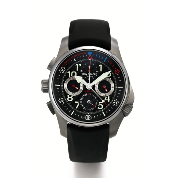 Girard-Perregaux A LIMITED EDITION LEFT-HANDED TITANIUM AUTOMATIC CHRONOGRAPH WRISTWATCH WITH DATE AND 24 HOURS INDICATION CIRCA 2007 BMW ORACLE TO COMMEMORATE 2007 AMERICA'S CUP, 87 'R&D 01-USA 87' CHALLENGER OF RECORD NO 102/750