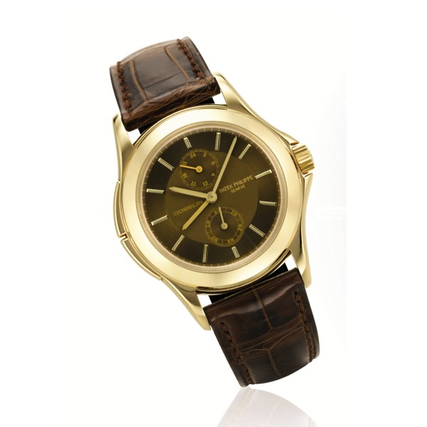 Patek Philippe A FINE LIMITED EDITION YELLOW GOLD DUAL TIME WRISTWATCH WITH 24 HOURS INDICATION MADE IN 2004 REF 5134 MVT 3086959 CASE 4224713 RETAILED BY GUBELIN