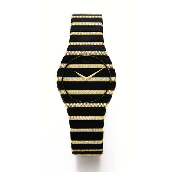 Piaget A YELLOW GOLD AND BLACKENED GOLD BACK WOUND BRACELET WATCH CIRCA 1985 REF 791 C 705 SERIAL 448629 POLO