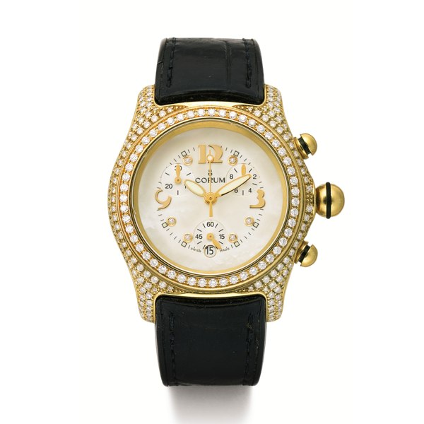 Corum A YELLOW GOLD AND DIAMOND-SET CHRONOGRAPH WRISTWATCH WITH MOTHER-OF-PEARL DIAL AND DATE CIRCA 2000