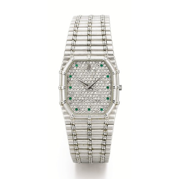 Audemars Piguet A VERY FINE AND UNUSUAL WHITE GOLD, EMERALD AND DIAMOND-SET BRACELET WATCH CIRCA 1980 NO C29634