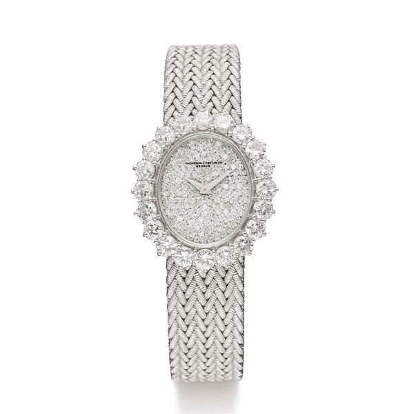 Vacheron Constantin A LADY'S WHITE GOLD AND DIAMOND-SET OVAL BACK-WOUND BRACELET WATCH CIRCA 1980 MVT 674932 CASE 510094P