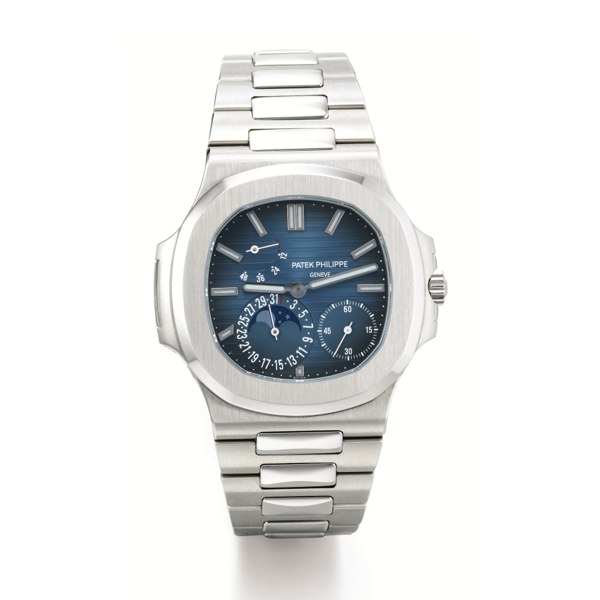 Patek Philippe A STAINLESS STEEL AUTOMATIC BRACELET WATCH WITH DATE, POWER RESERVE INDICATION AND MOON-PHASES MADE IN 2006 REF 5712/1A MVT 3173006 CASE 4376139 NAUTILUS
