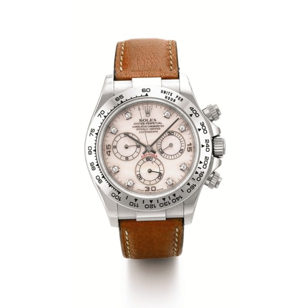 Rolex A WHITE GOLD AUTOMATIC CHRONOGRAPH WRISTWATCH WITH REGISTERS, TACHOMETER AND DIAMOND-SET MOTHER-OF-PEARL DIAL CIRCA 2002 REF 116519 COSMOGRAPH DAYTONA