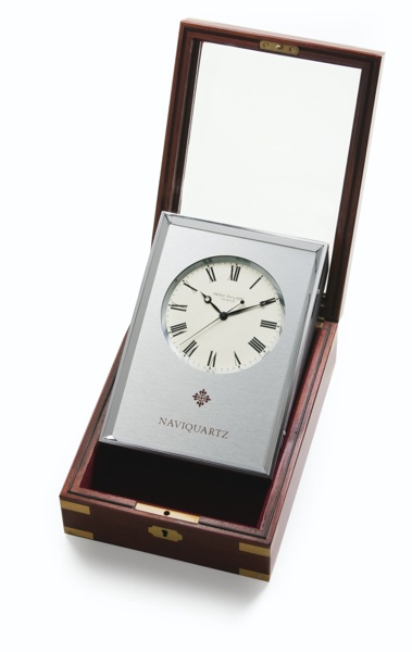 Patek Philippe A RECTANGULAR CENTER SECONDS TIMEPIECE IN A BRASS BOUND ROSEWOOD CASE MADE IN 1976 REF 1207/33 NAVIQUARTZ MVT 1803112