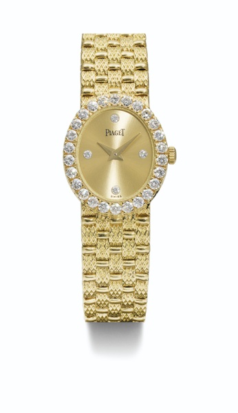 Piaget A LADY'S YELLOW GOLD AND DIAMOND-SET OVAL BRACELET WATCH WITH DIAMOND-SET INDEXES CIRCA 1980 REF 8326 D23