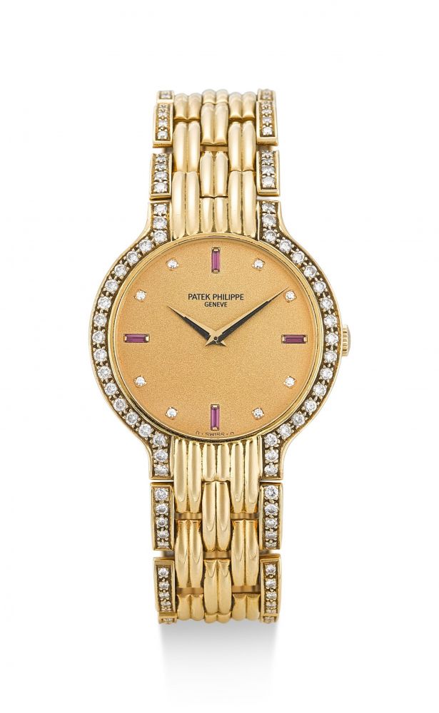 PATEK PHILIPPE | CALATRAVA JOALLERIE, REFERENCE 3965, A YELLOW GOLD, DIAMOND AND RUBY-SET BRACELET WATCH, CIRCA 1989