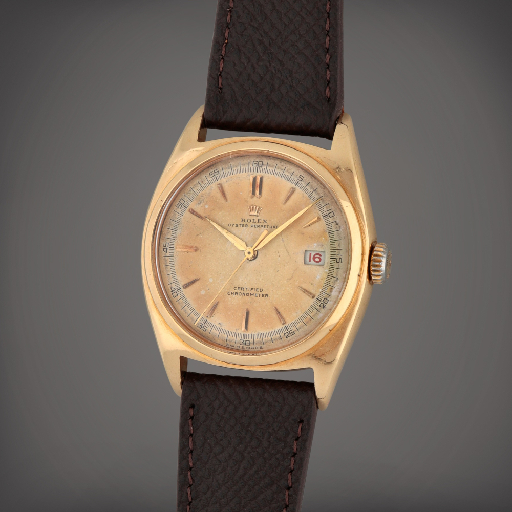 Oyster Perpetual 'Ovettone', Reference 6030 | A pink gold wristwatch with date | Circa 1950