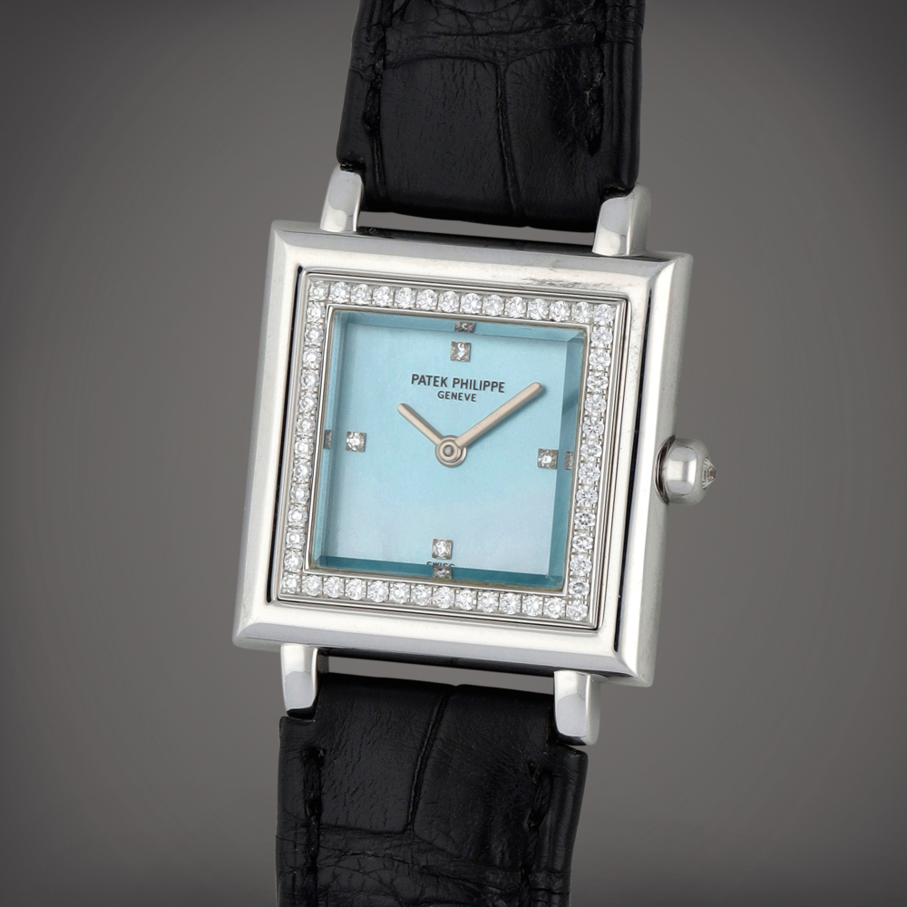 Reference 4866/100 | A white gold and diamond-set wristwatch with blue mother-of-pearl dial | Circa 2000