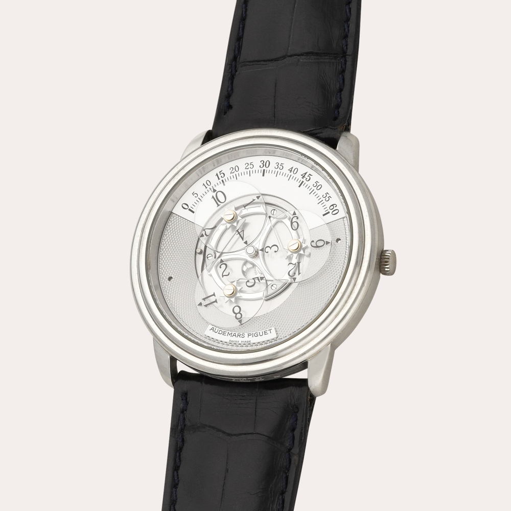 PROPERTY OF AN IMPORTANT BRITISH COLLECTOR Audemars Piguet Star Wheel Automatic, Reference 25720 | A platinum semi-skeletonised wristwatch with satellite hour display | Circa 1997