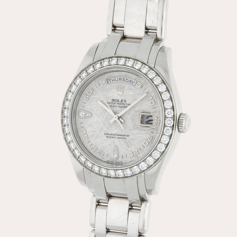 Rolex Day-Date Pearlmaster, Reference 18946 | A platinum and diamond-set wristwatch with day, date, bracelet and meteorite diamond-set dial | Circa 2005