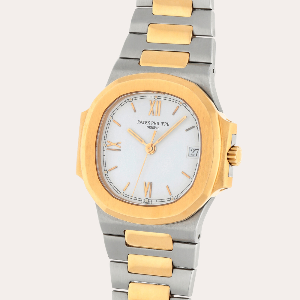 Patek Philippe Nautilus, Reference 3800/1 | A stainless steel and yellow gold wristwatch with date and bracelet | Made in 1996