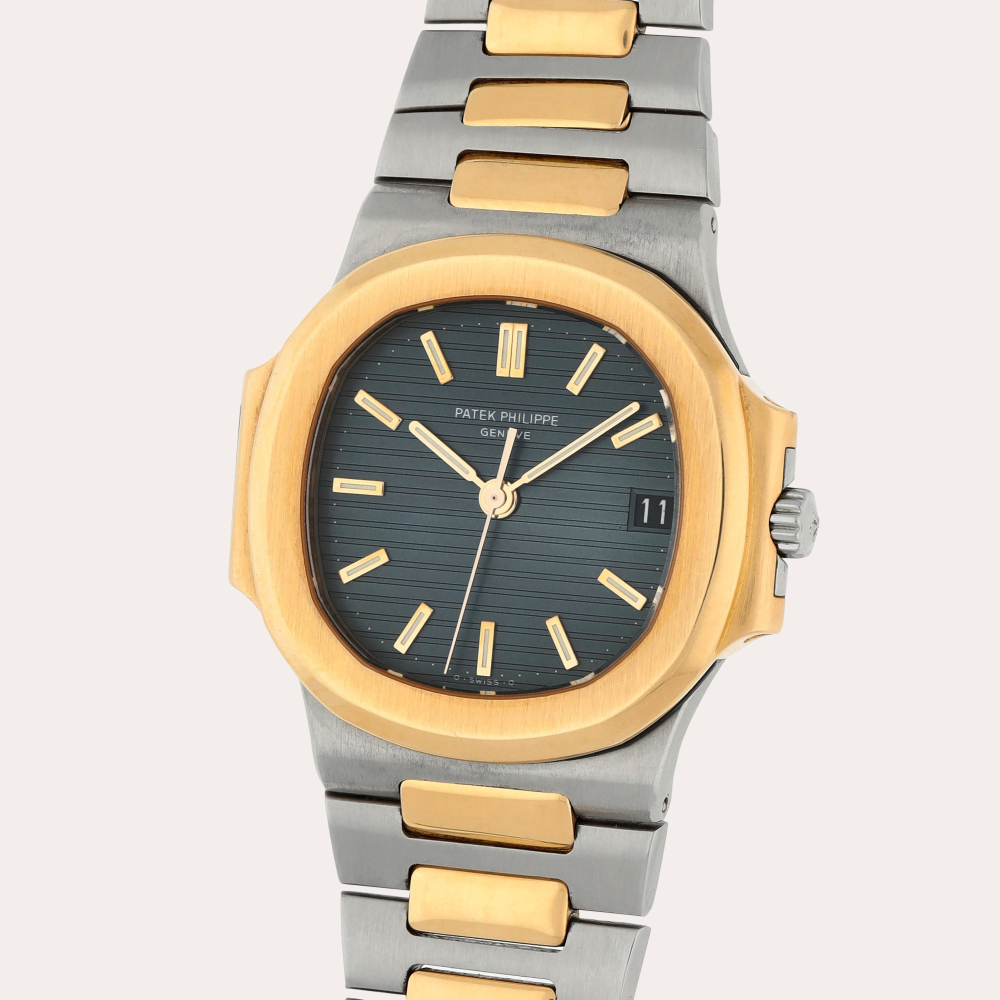 Patek Philippe Nautilus, Reference 3800/1 | A stainless steel and yellow gold wristwatch with date and bracelet | Circa 1984