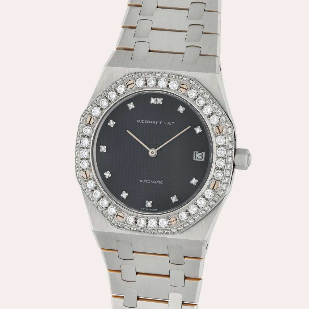 Audemars Piguet Royal Oak 'Jumbo', Reference 5402BC | A white gold and diamond-set wristwatch with date and bracelet | Circa 1980