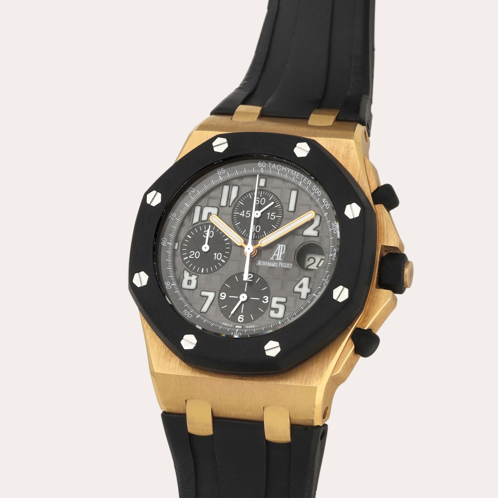 Audemars Piguet Royal Oak Offshore, Reference 25940OK.OO.D002CA.01.A | A pink gold and rubber chronograph wristwatch with date | Circa 2006