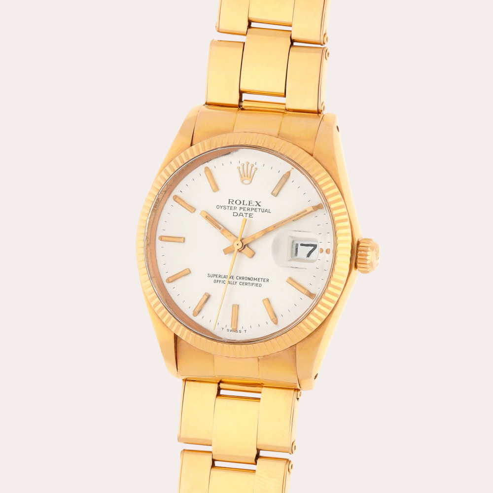 Rolex Oyster Perpetual Date, Reference 1503 | A yellow gold wristwatch with date and bracelet | Circa 1972