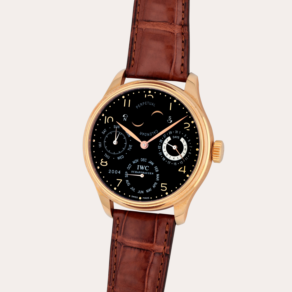 IWC Portugieser, Reference 502103 | A pink gold perpetual calendar wristwatch with Northern and Southern hemisphere moon phases, power reserve and year indication | Circa 2004