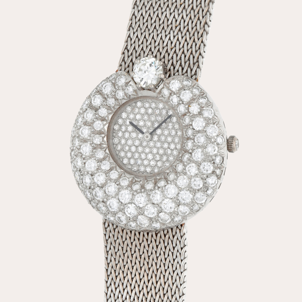 Gérald Genta Reference G 1750.7 | A white gold and diamond-set bracelet watch | Circa 1970