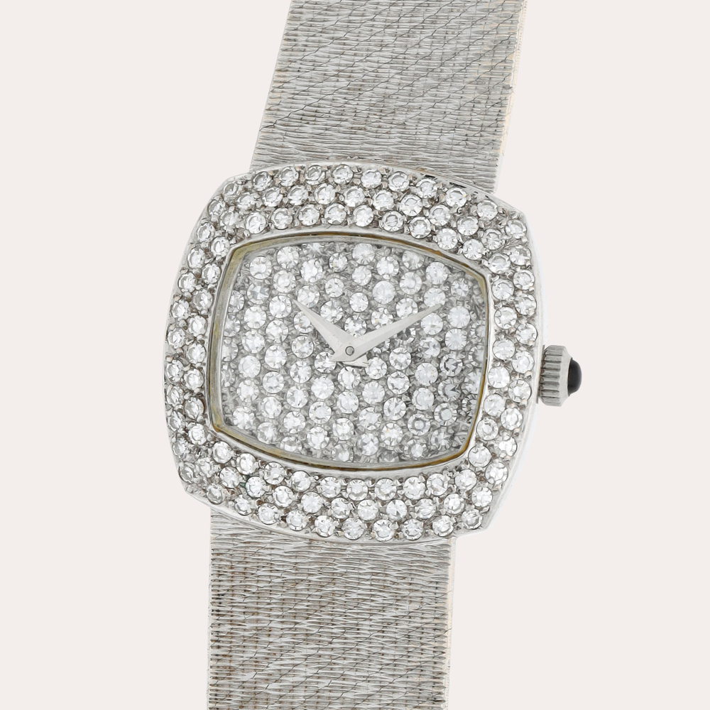 Delaneau 'Khanjar' | A white gold and diamond-set bracelet watch | Circa 1990