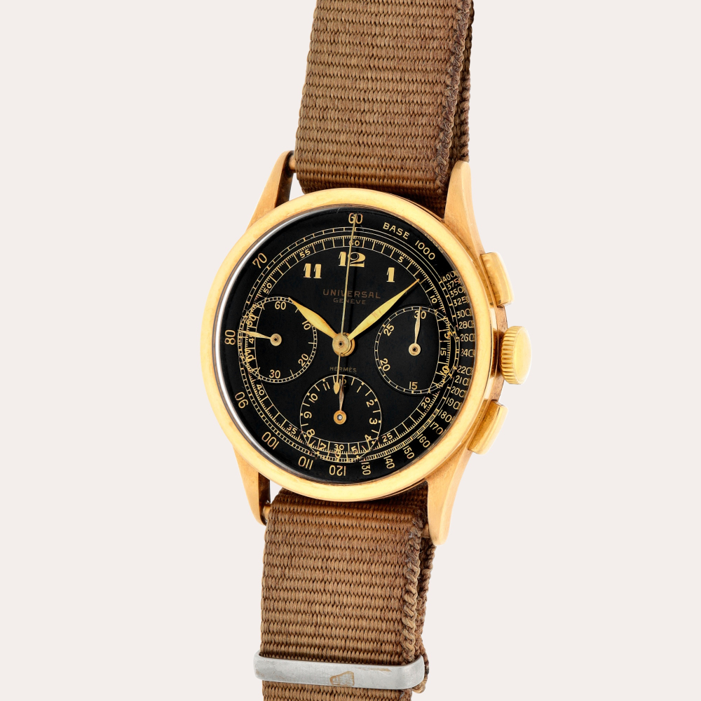 Universal Genève Retailed by Hermès: Compax, Reference 5922 | A yellow gold chronograph wristwatch | Circa 1937