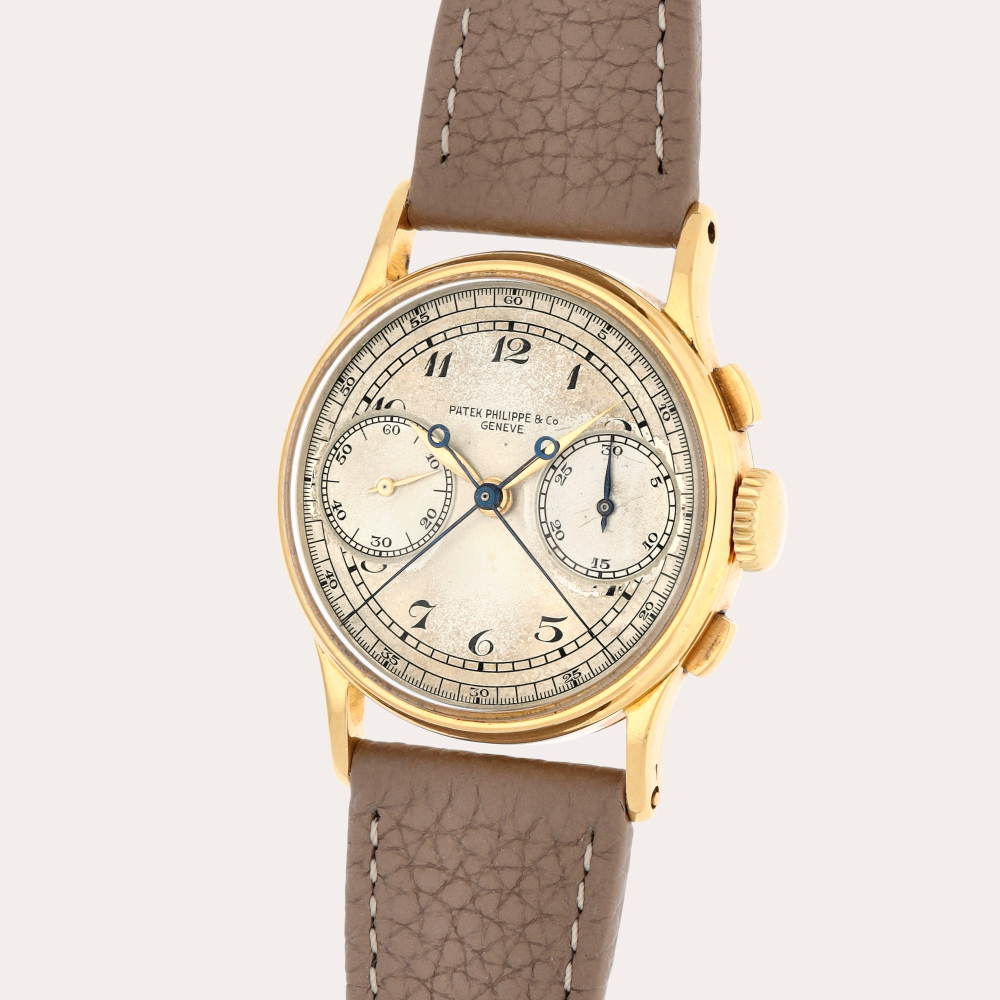 Patek Philippe Reference 1436 | A unique yellow gold split-second chronograph wristwatch with hard enamel Breguet numerals and oversized registers | Made in 1942